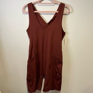 NWT free people movement here on out onesie size extra large